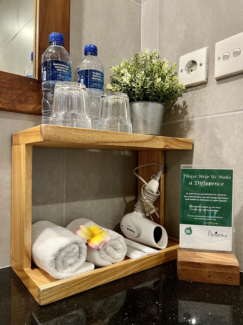 Shower, hair dryer, slippers, towels