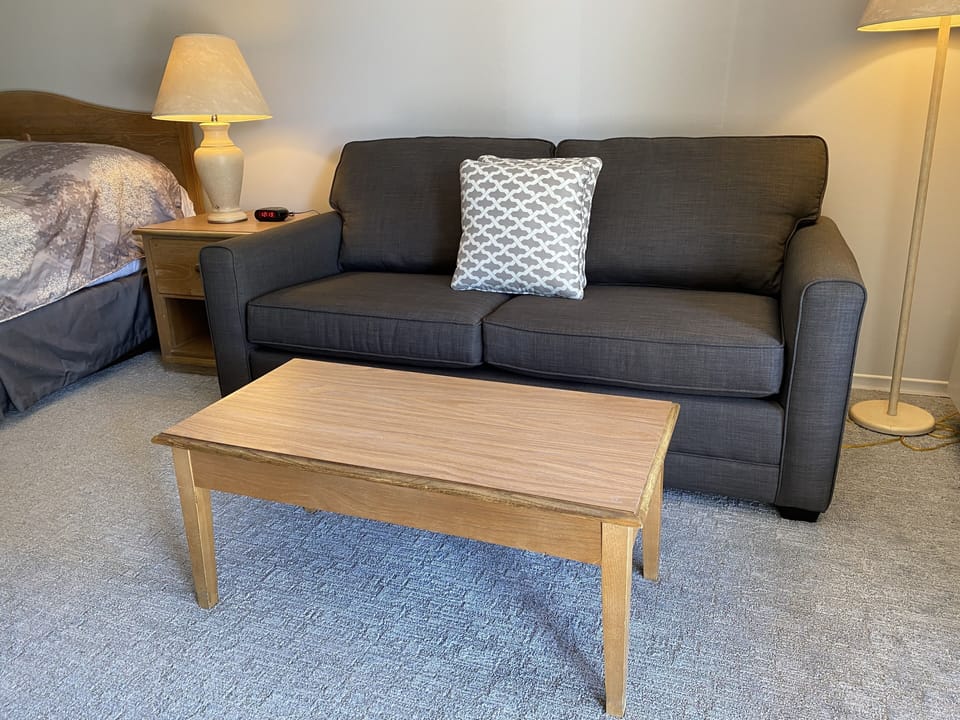 Suite, 1 King Bed with Sofa bed | Living room | 40-inch LCD TV with digital channels, TV