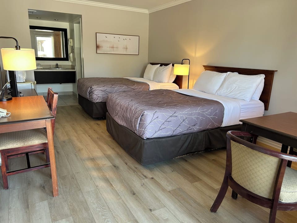 Standard Room, 2 Double Beds | Down comforters, pillowtop beds, desk, blackout drapes