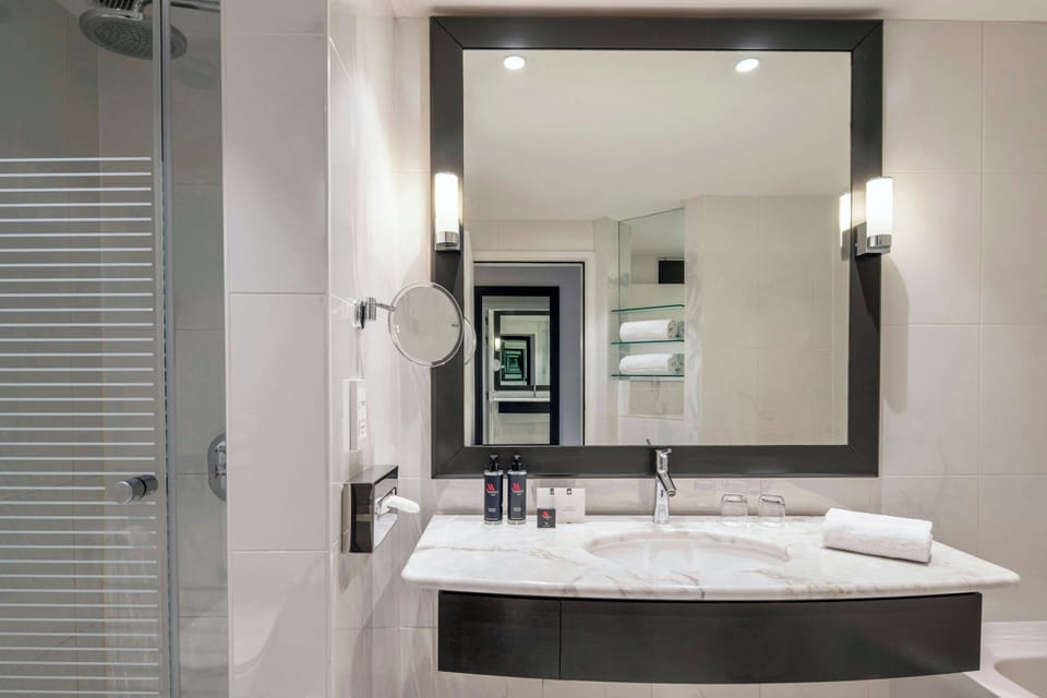 Separate tub and shower, free toiletries, hair dryer, towels