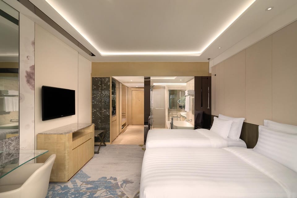Twin Room, 2 Twin Beds (Deluxe River View) | 1 bedroom, hypo-allergenic bedding available, in-room safe, desk