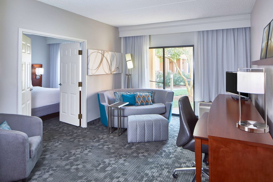 Premium bedding, pillowtop beds, desk, laptop workspace