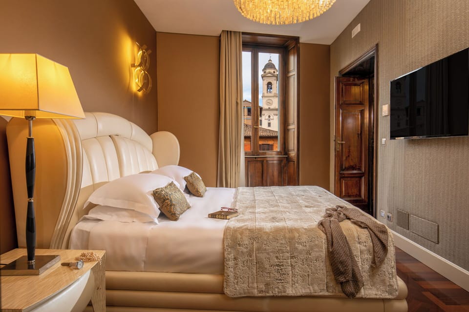 Premium bedding, down comforters, pillowtop beds, minibar