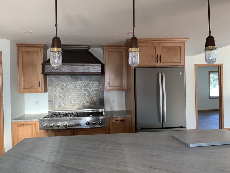 Kitchen stove and refrigerator
