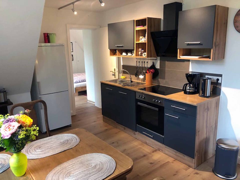 Apartment, 2 Bedrooms, Balcony, Garden View | Private kitchenette | Full-size fridge, oven, stovetop, dishwasher