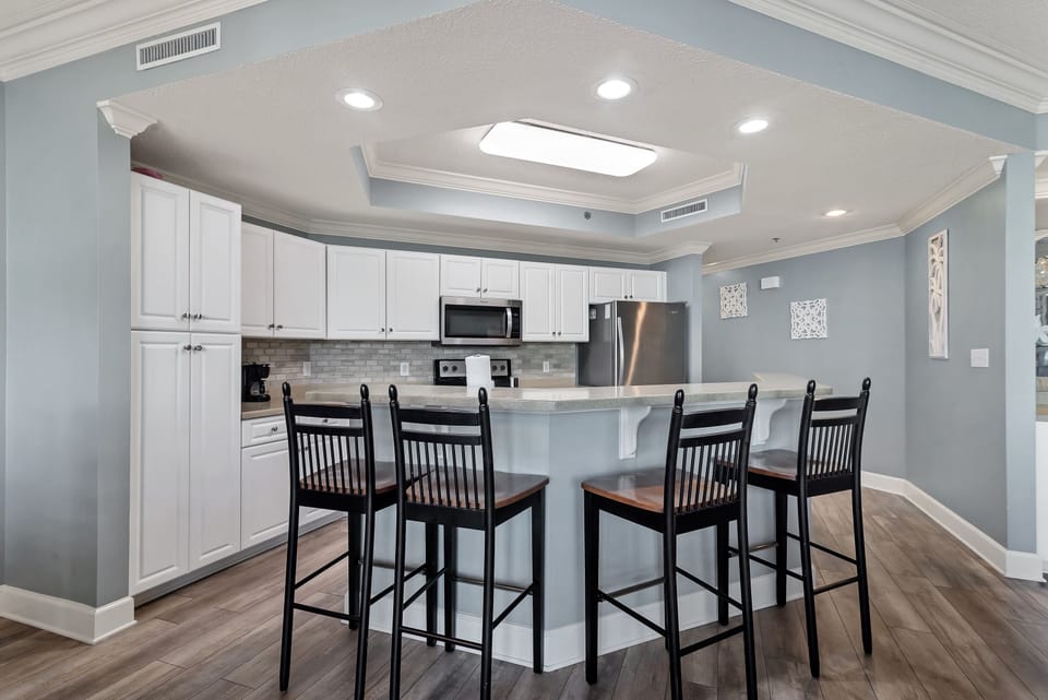 Enjoy casual dining and conversation at the expansive breakfast bar in this beautifully updated kitchen.
