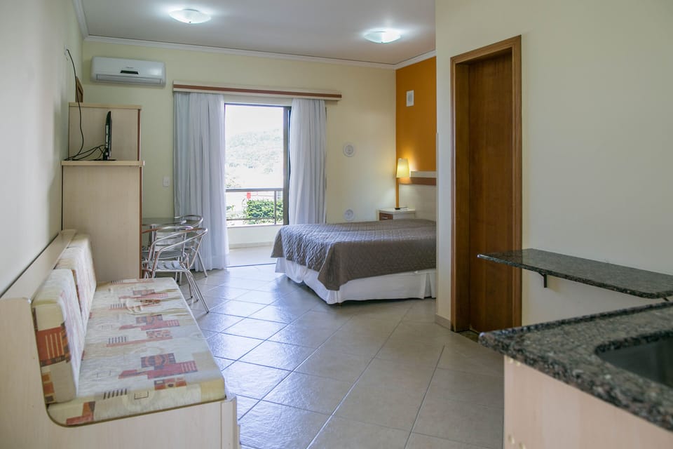 Traditional Suite | Minibar, in-room safe, blackout drapes, free WiFi