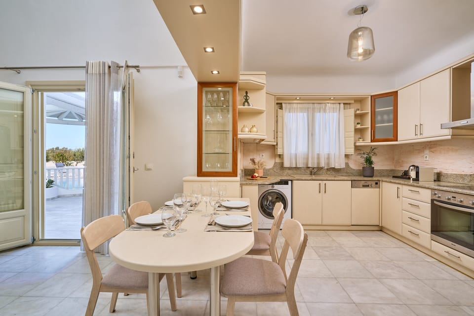 The kitchen has direct access to the pool terrace. 