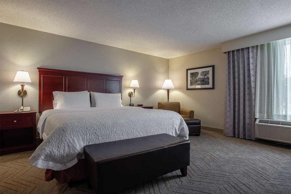 Signature Suite, 1 King Bed with Sofa bed, Accessible | Living area | 32-inch LCD TV with cable channels, TV, pay movies