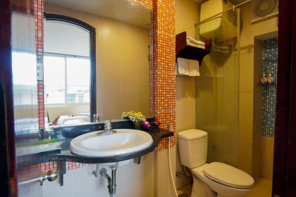 Shower, rainfall showerhead, designer toiletries, hair dryer
