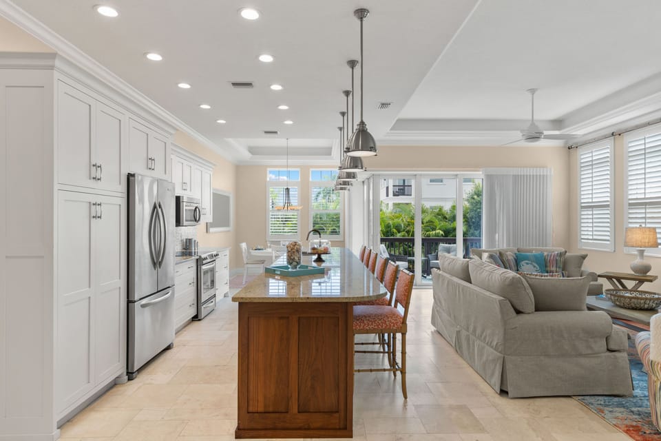 An elegant kitchen island ideal for morning coffee and evening bites.