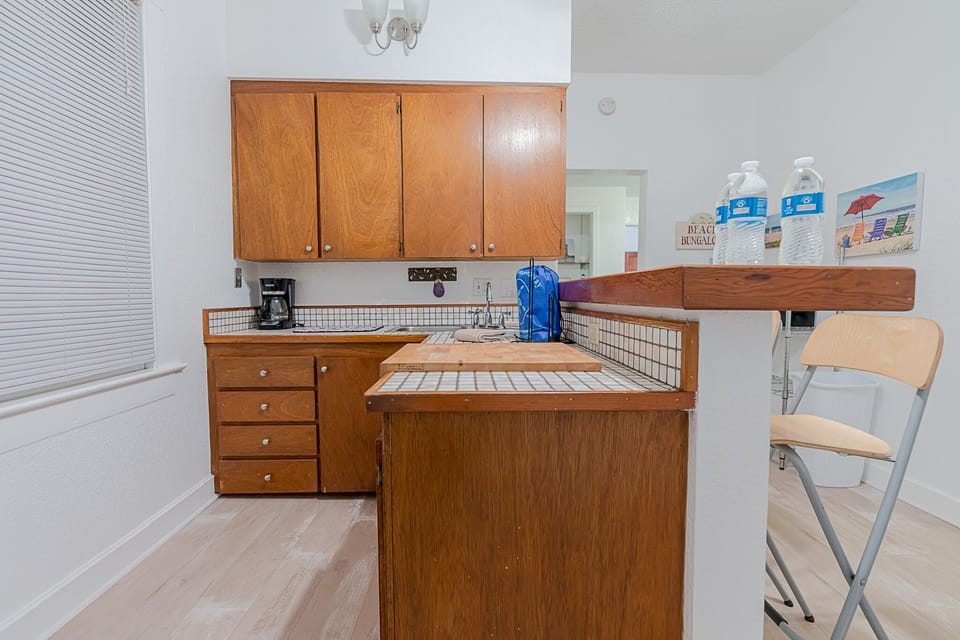 Cabinets full of cookware, dinner ware, glassware