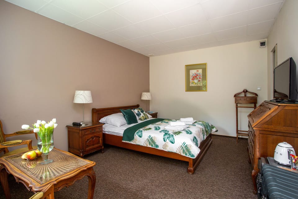 King-size bed and tv set