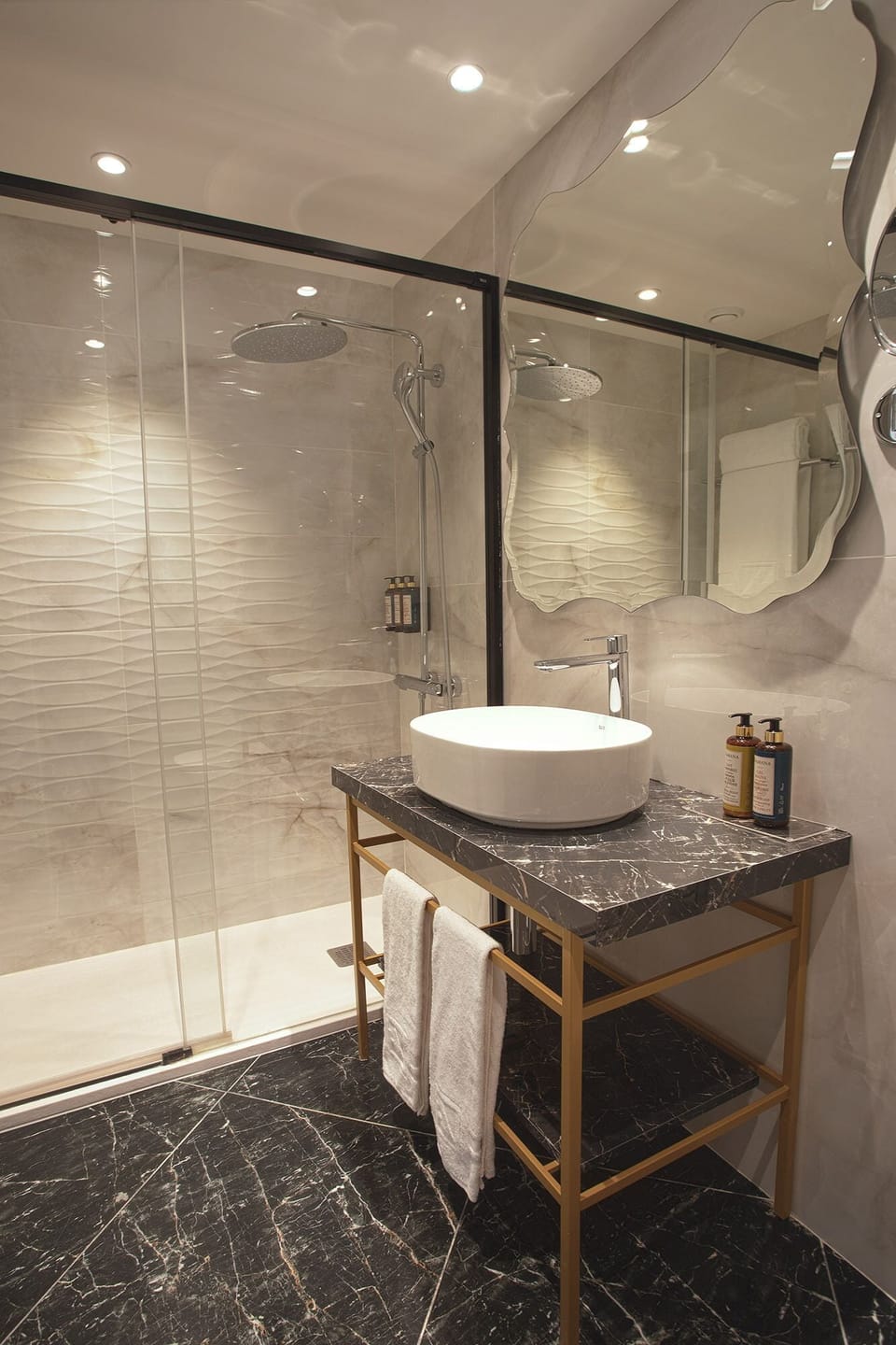 Shower, eco-friendly toiletries, hair dryer, towels