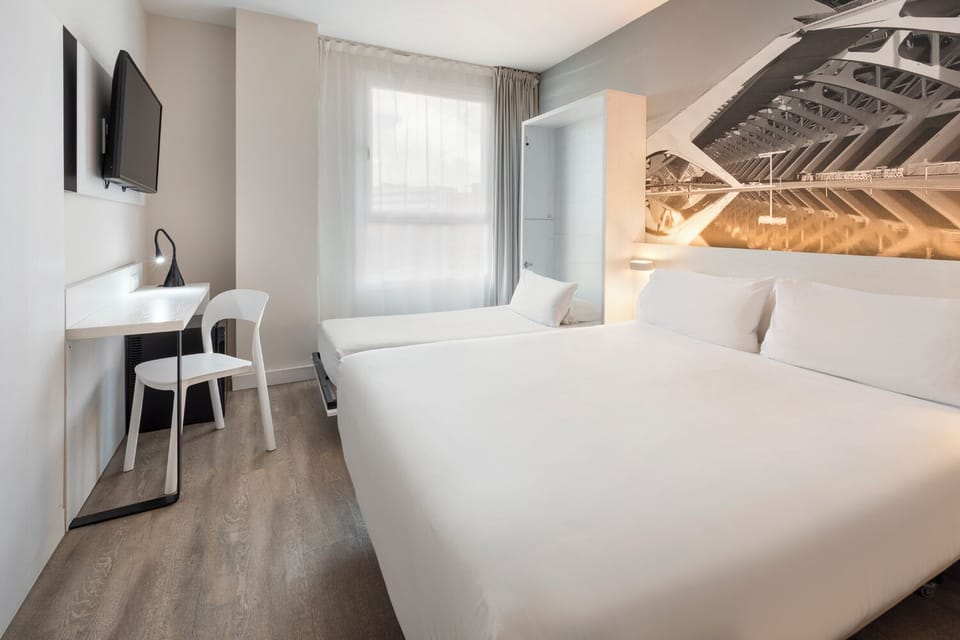 Family Triple Room | Premium bedding, in-room safe, desk, free WiFi