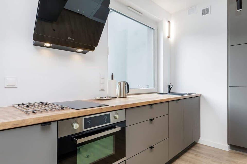 The kitchenette's practical layout maximizes space and functionality.