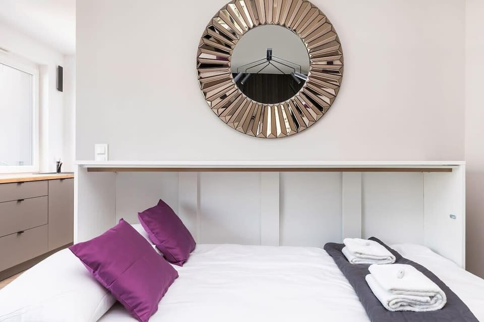 The living area's minimalist decor that enhances its elegant and modern feel.