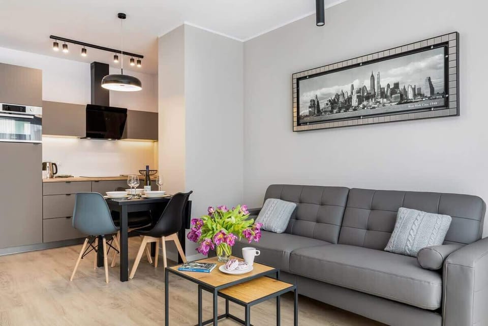 Living room with a comfortable sofa and TV. 