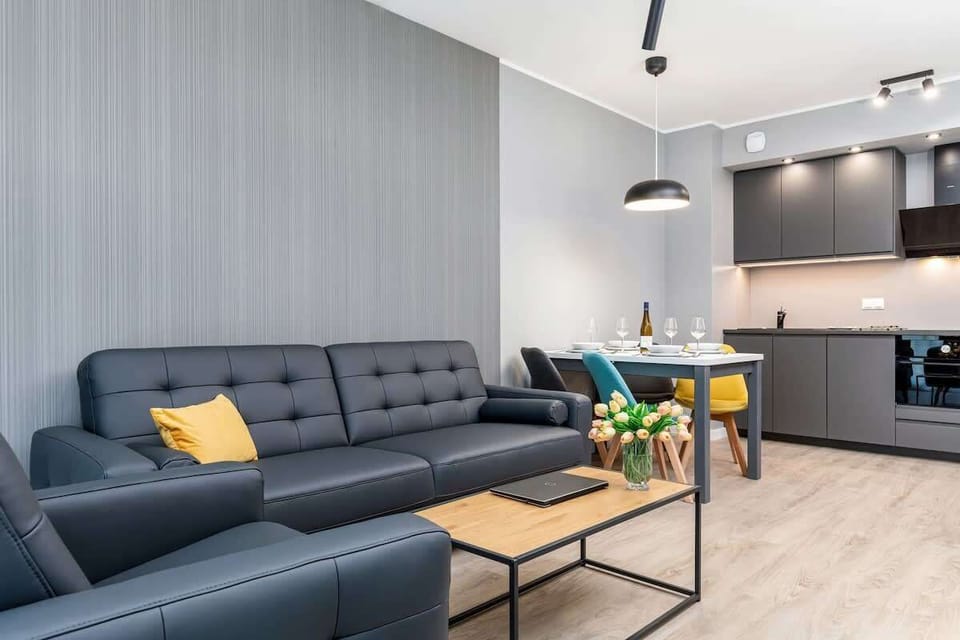 The living room's beautiful design complemented by natural light streaming in.