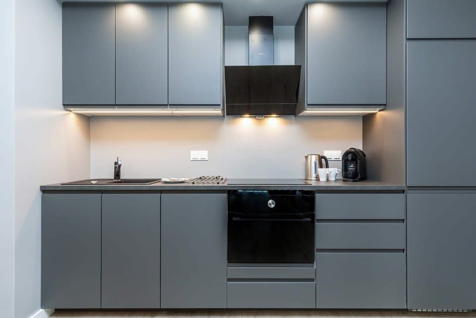 The fully equipped kitchenette includes everything you need for a home-cooked meal.