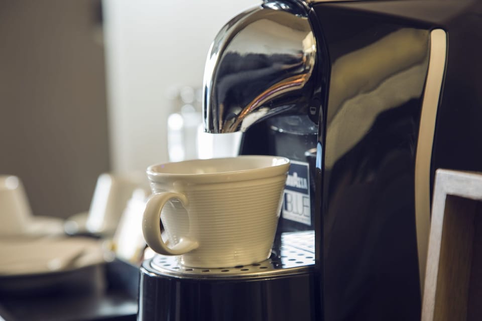 Executive Suite, 1 King Bed with Sofa bed, Terrace | Coffee and/or coffee maker