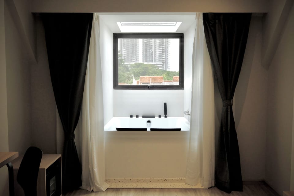 Deluxe Skylight | Bathroom | Free toiletries, hair dryer, bathrobes, slippers