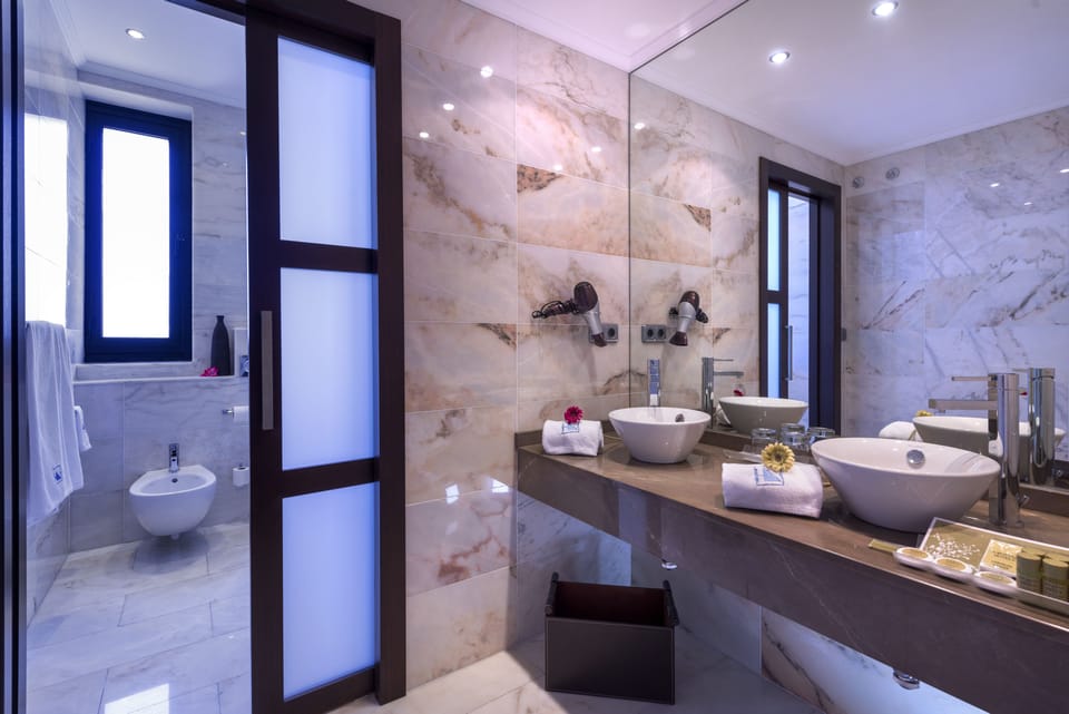 Premium Room (2 Adults and 2 Children) | Bathroom | Bathtub, eco-friendly toiletries, hair dryer, towels