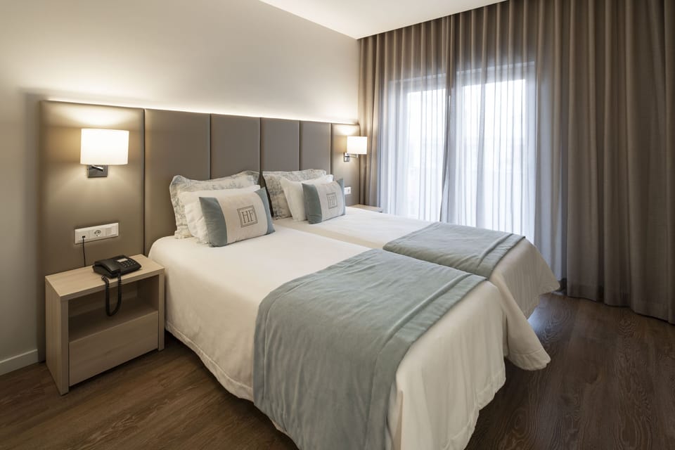 Hypo-allergenic bedding, minibar, in-room safe, desk