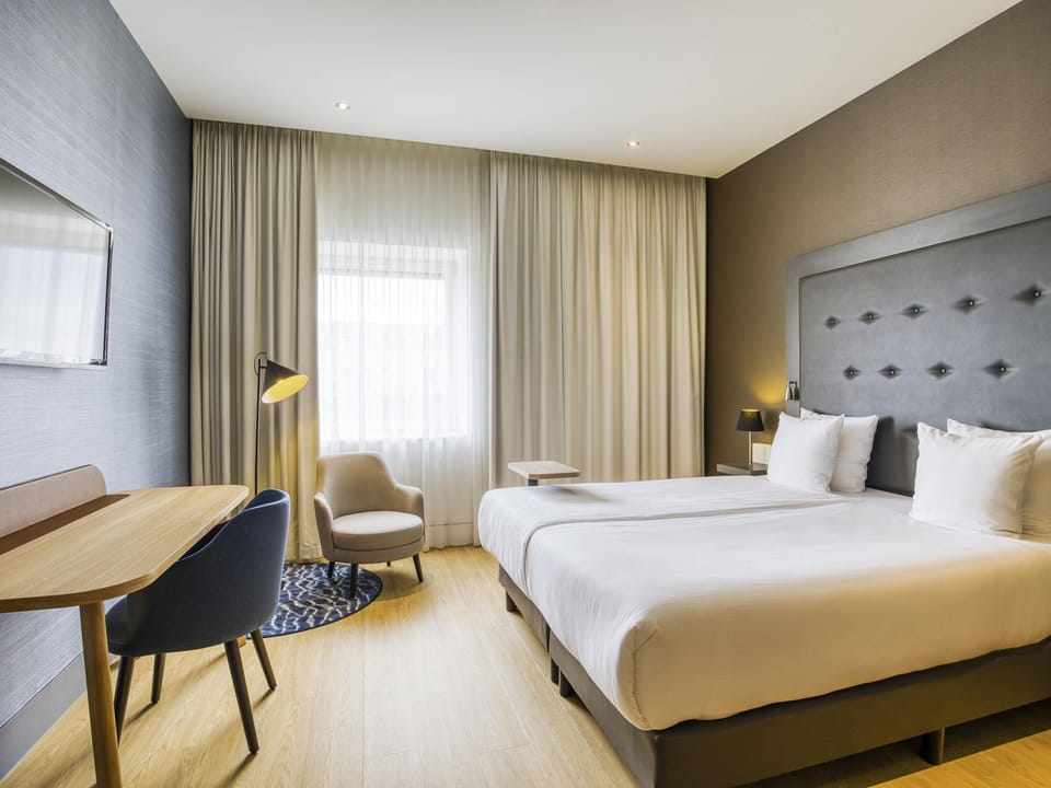 Hypo-allergenic bedding available, minibar, in-room safe, desk