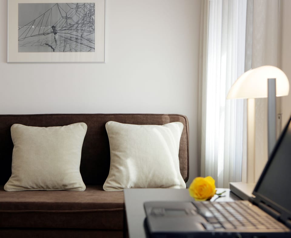 Superior Triple Room, Balcony | Minibar, in-room safe, desk, blackout drapes