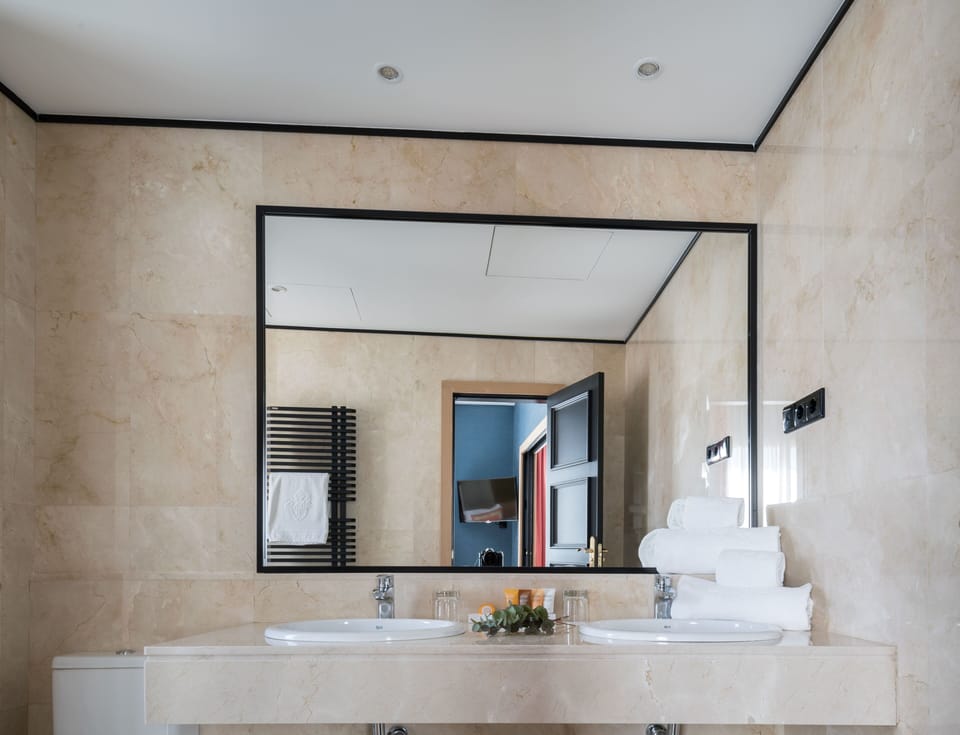 Junior Suite | Bathroom | Bathtub, deep soaking tub, free toiletries, hair dryer