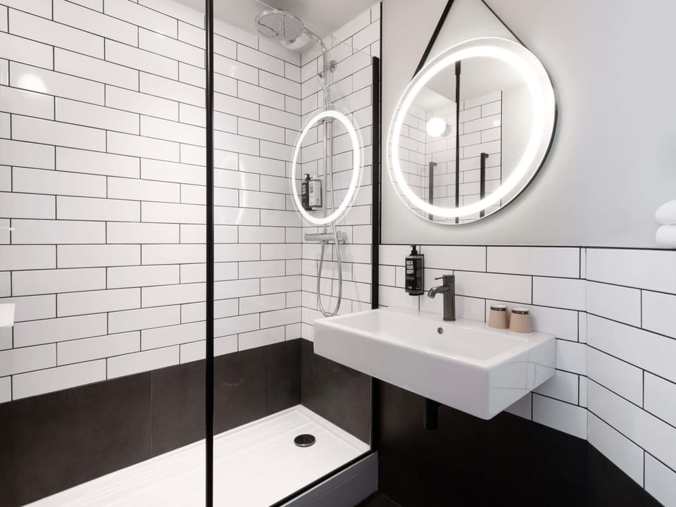 Triple Room (1 Double Bed and 1 Single Sofa Bed) | Bathroom | Hair dryer, towels