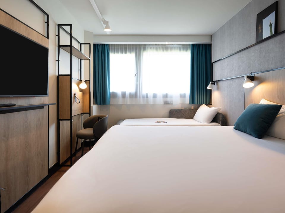 Triple Room (1 Double Bed and 1 Single Sofa Bed) | In-room safe, desk, blackout drapes, soundproofing