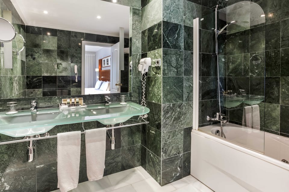 Shower, eco-friendly toiletries, hair dryer, bidet
