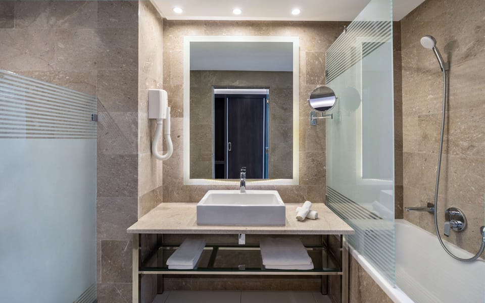 Rainfall showerhead, free toiletries, hair dryer, slippers