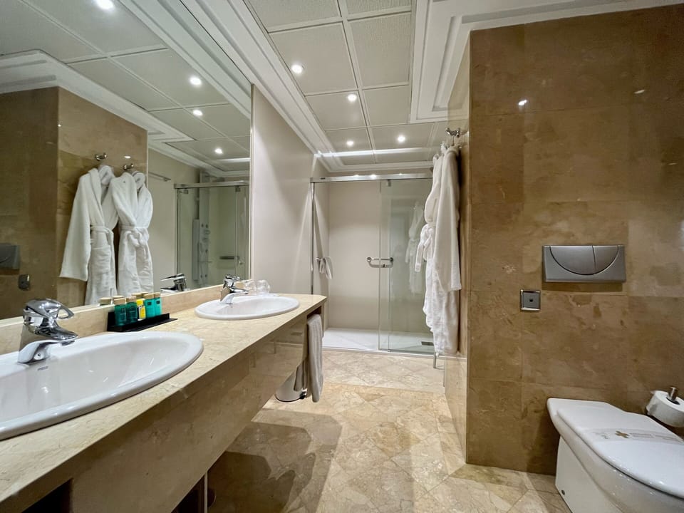 Superior Room | Bathroom | Combined shower/tub, deep soaking tub, hair dryer, bidet