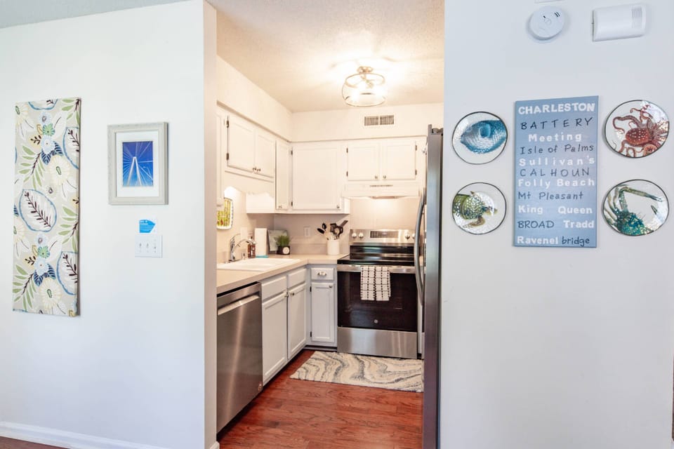 The kitchen is located adjacent to the dining area.