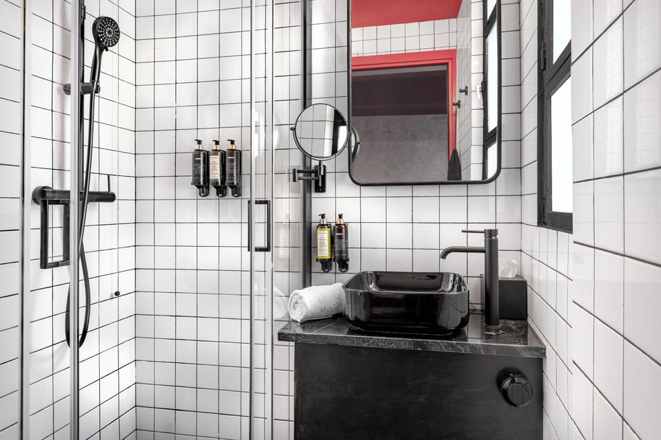 Shower, free toiletries, hair dryer, slippers