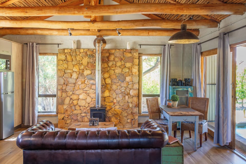 Farm Cottage- Lady Red | Living area | Fireplace