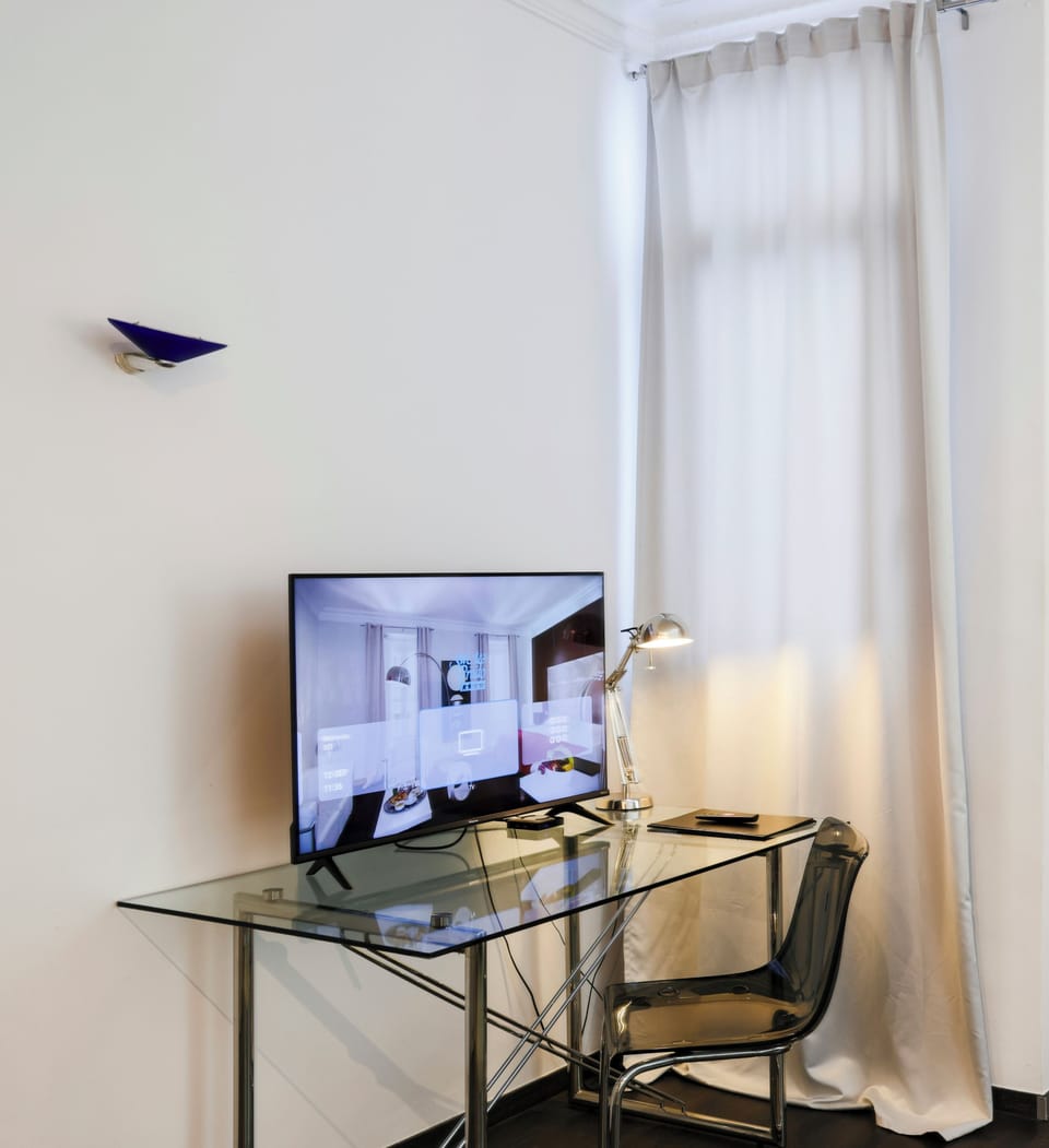 Junior Single Room | Down comforters, minibar, in-room safe, individually decorated