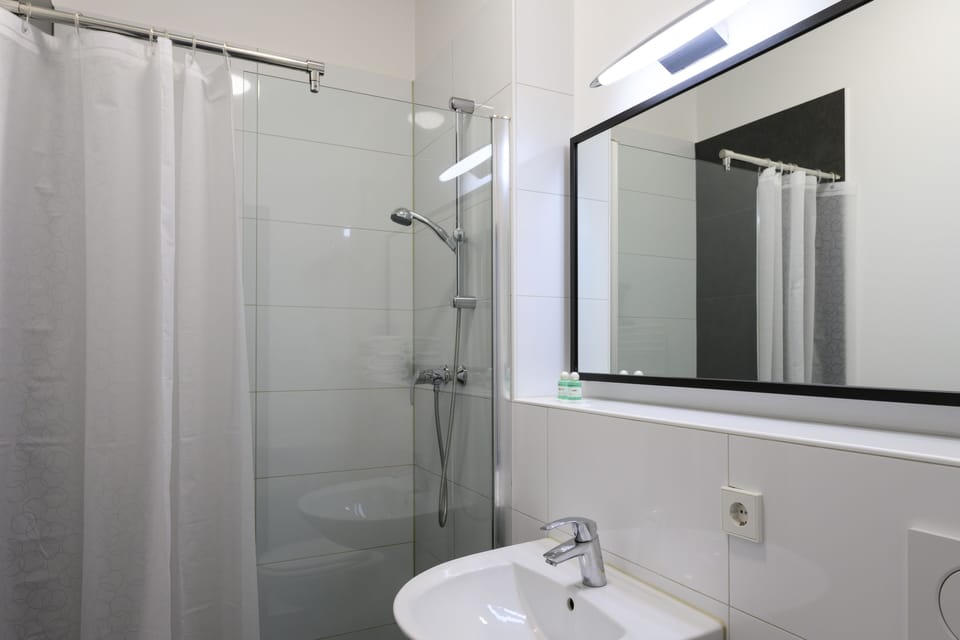 Shower, towels, soap, shampoo