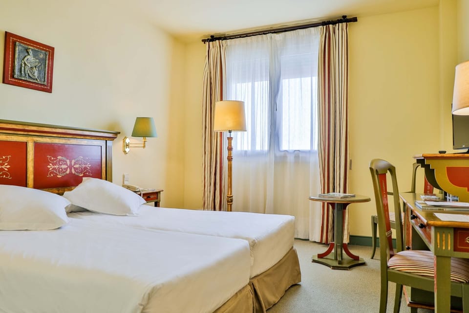 Minibar, desk, laptop workspace, cribs/infant beds