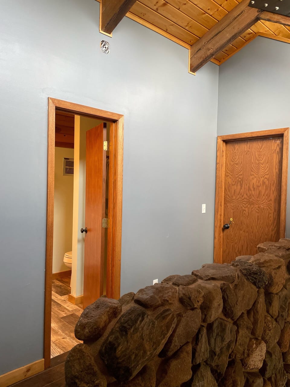 Each loft bedroom has its own door and are connected by a hallway w/bathroom 