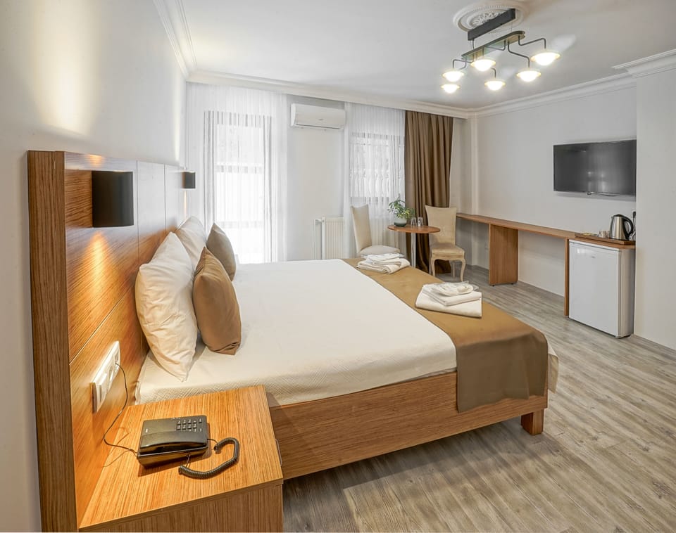 Economy Triple Room | Frette Italian sheets, premium bedding, desk, iron/ironing board