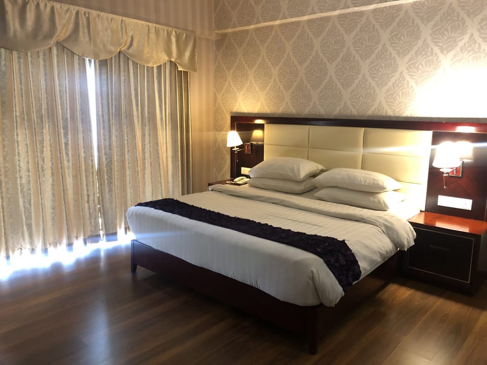 Family Suite | In-room safe, desk, blackout drapes, iron/ironing board