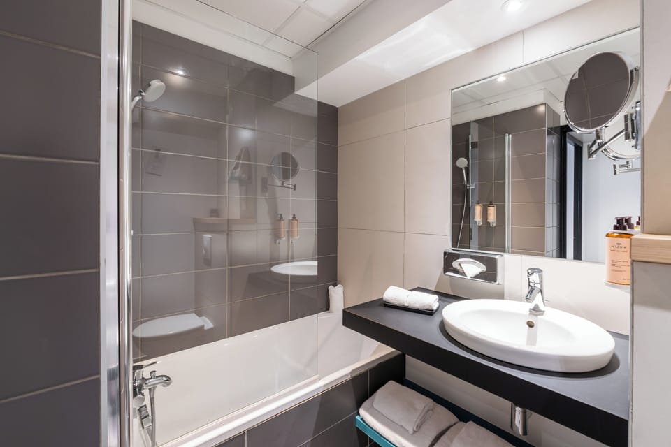 Eco-friendly toiletries, hair dryer, towels, soap