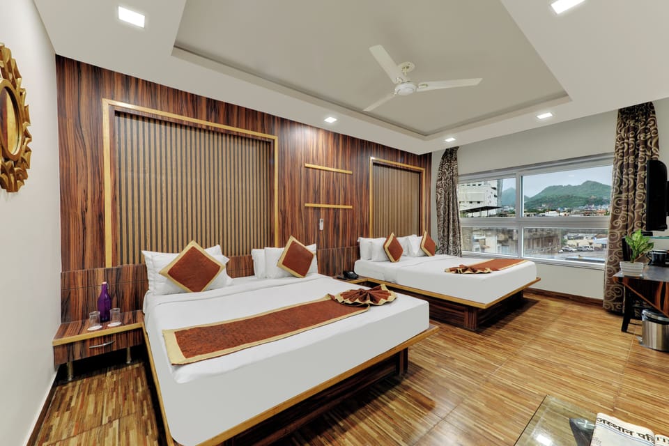 Family Suite | Minibar, in-room safe, desk, iron/ironing board (on request)