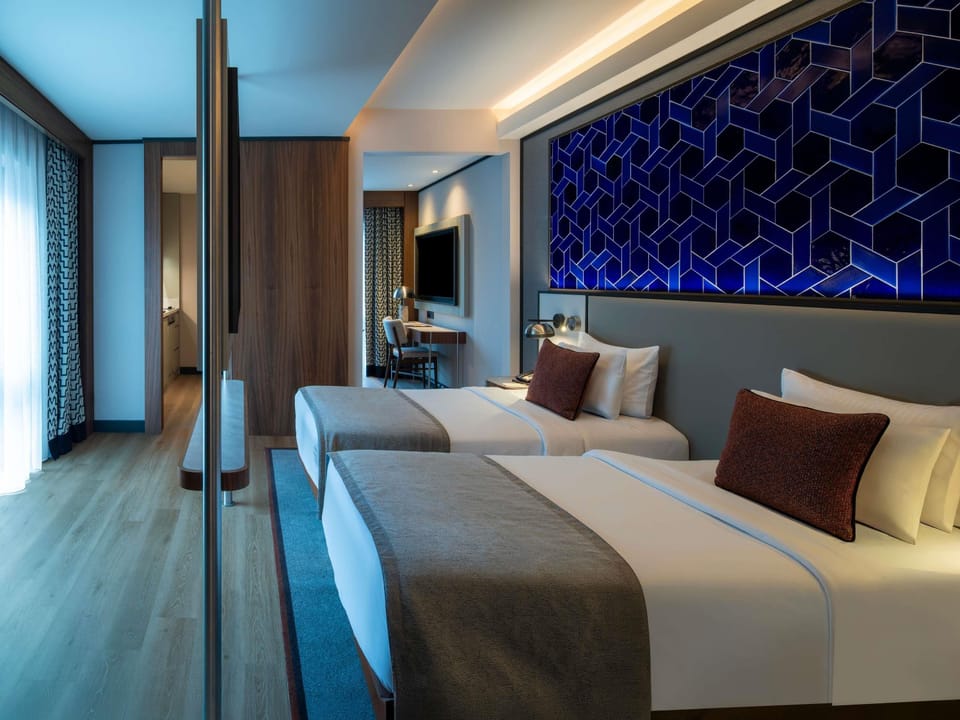 Superior Room, Multiple Beds | Down comforters, minibar, in-room safe, desk