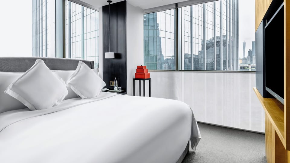 Premium bedding, down comforters, minibar, in-room safe
