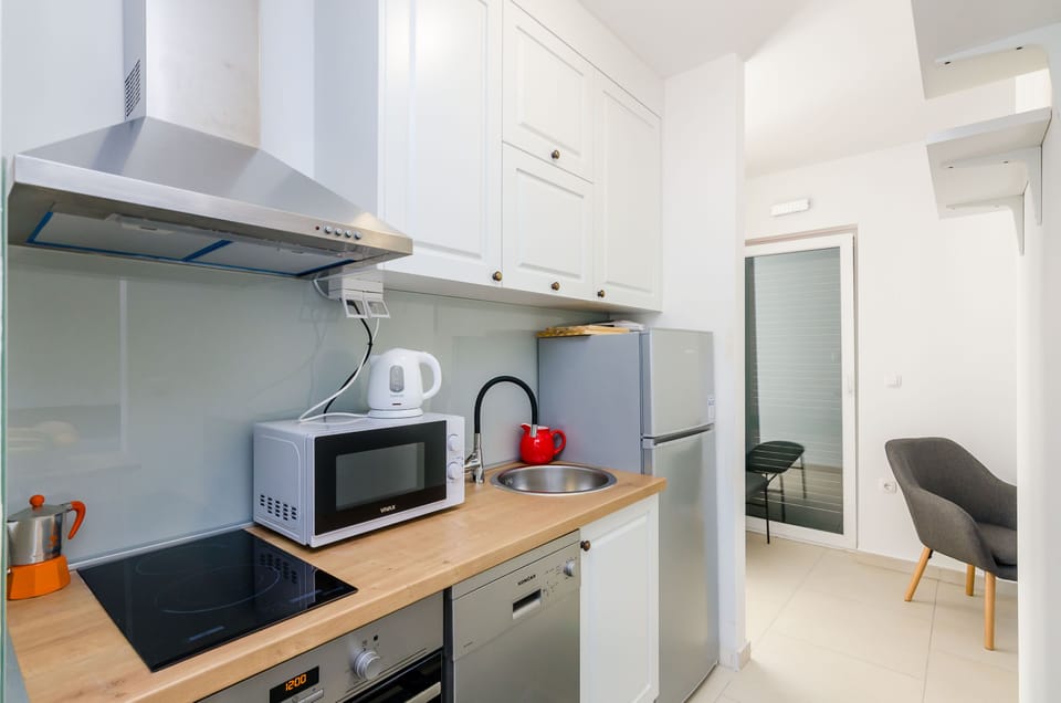 House (Two-Bedroom Holiday Home) | Private kitchen | Fridge